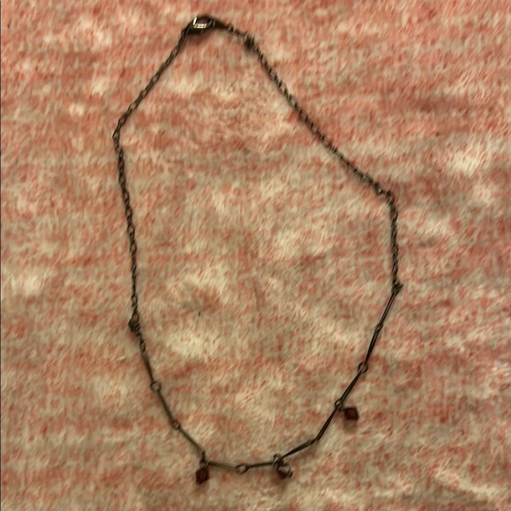 Elegant Purple and Black Necklace with Intricate Design